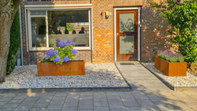 Wat is een cortenstaal plantenbak en waarom kiezen tuinliefhebbers ervoor?